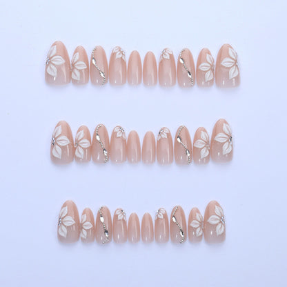 Artificial nail set with elegant flower designs and shimmering accents Acalora