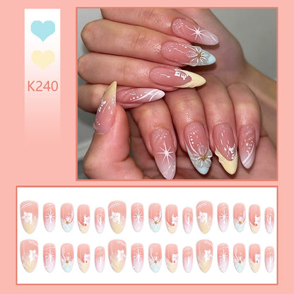 Artificial nail set with intricately detailed floral designs and shine accents Acalora