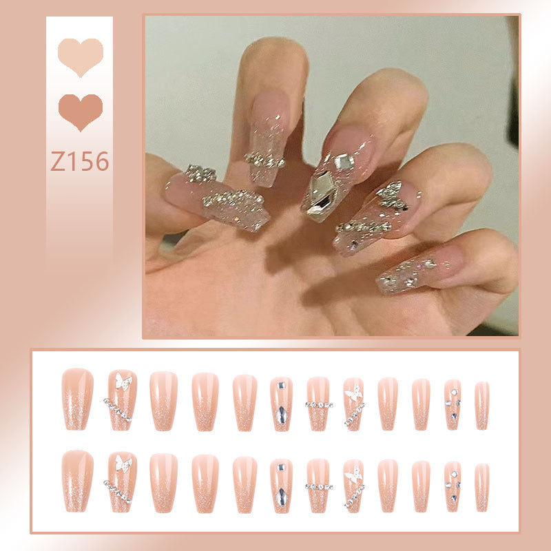 Glamorous artificial nails with sparkling rhinestones and elegant designs Acalora