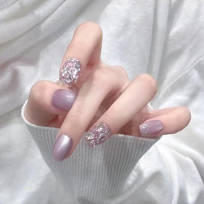 Artificial nail set with glitter and metallic effects Acalora