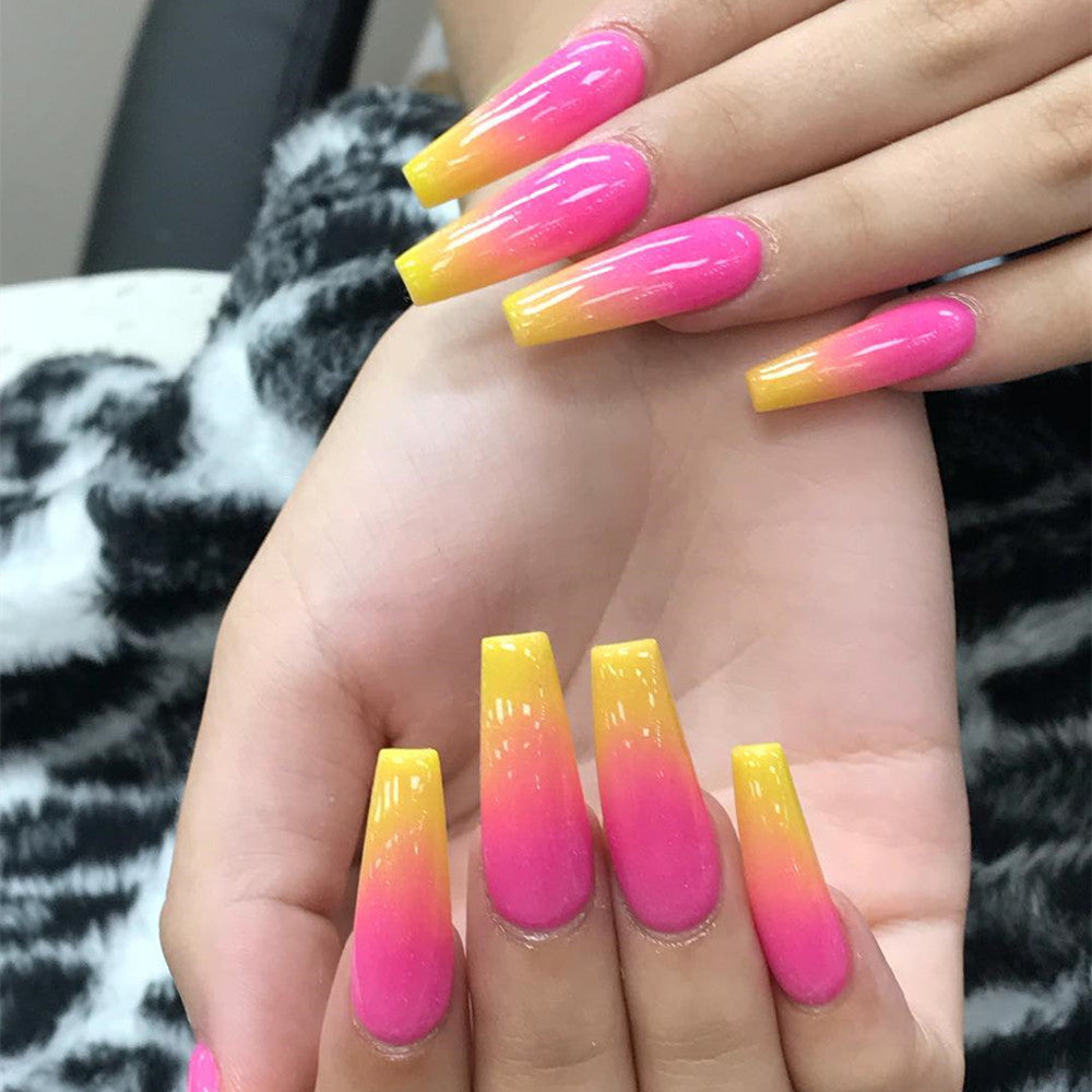 Artificial nail tips in modern ombre design Acalora