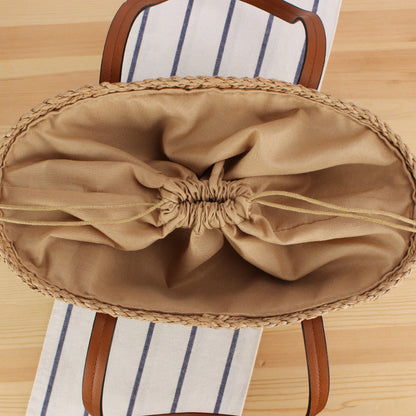Durable straw tote bag with sturdy leather handles Bowlift