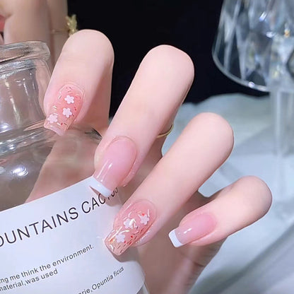 Nail art set with floral decorations and elegant French design Acalora