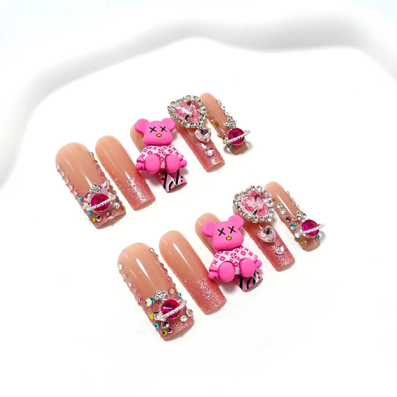 Artificial nails with romantic heart design and fine accents Acalora