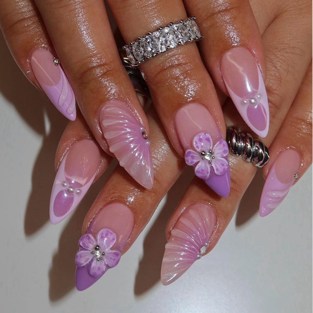 Artistic Stiletto Press-On Nail Art with Floral and Gemstone Accents Acalora