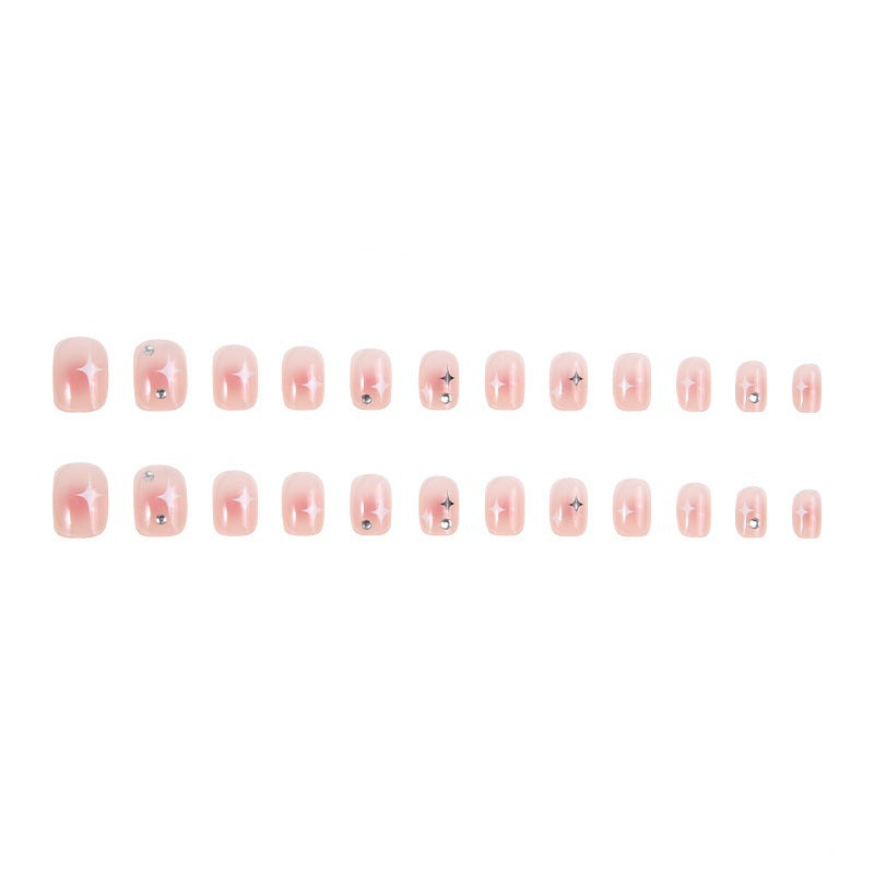 Acrylic nail set with sparkling star decorations and elegant accents Acalora