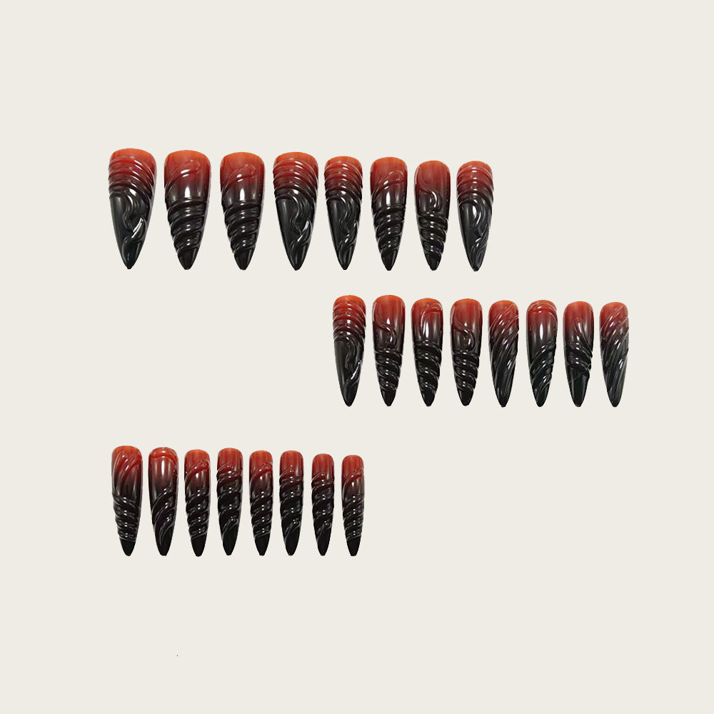 Gothic-style artificial nails with pointed tips and shiny surface Acalora