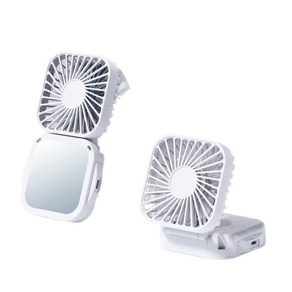 Unisex nan compact foldable clip on handheld desk fan with built in mirror adjustable tilt and USB rechargeable battery Bowlift