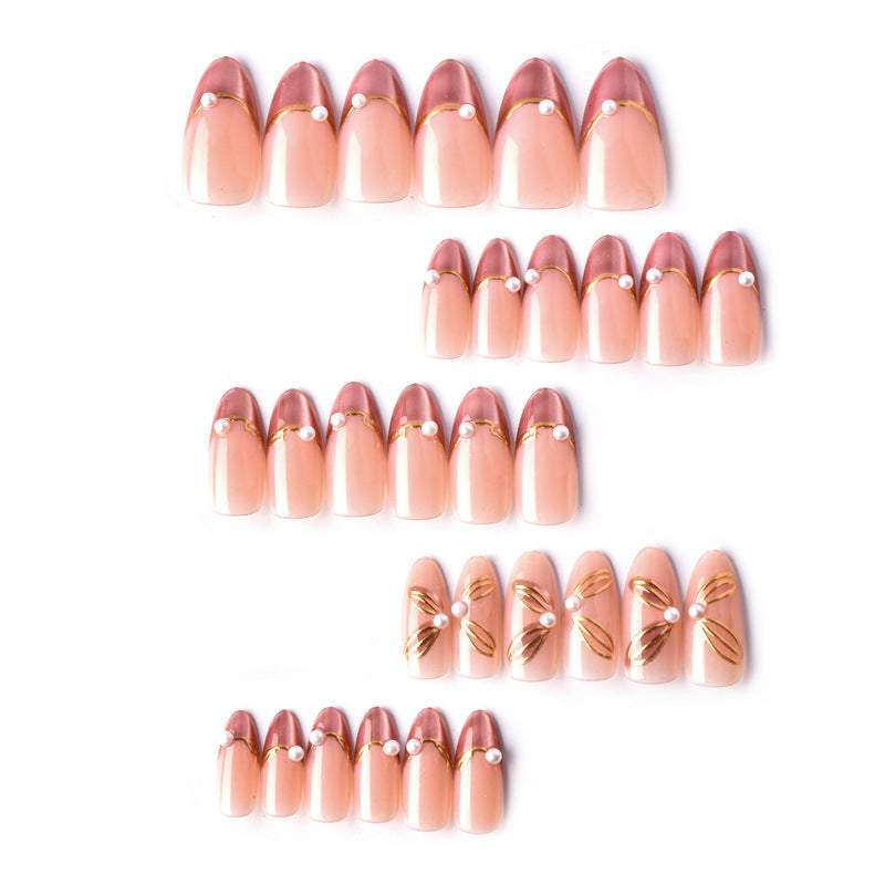 Nail set with glamorous golden accents and elegant design Acalora