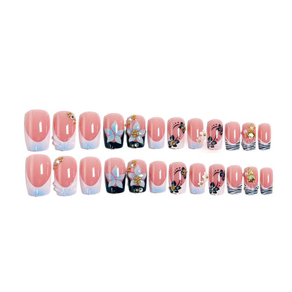 Artificial nails in creative floral design with glitter accents Acalora