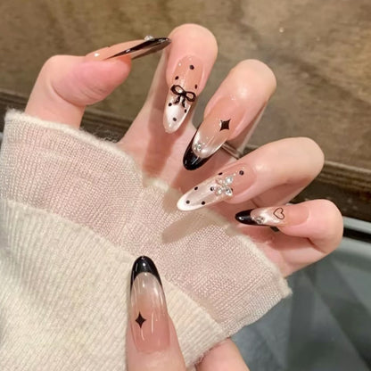 Glamorous artificial nails with creative embellishments Acalora