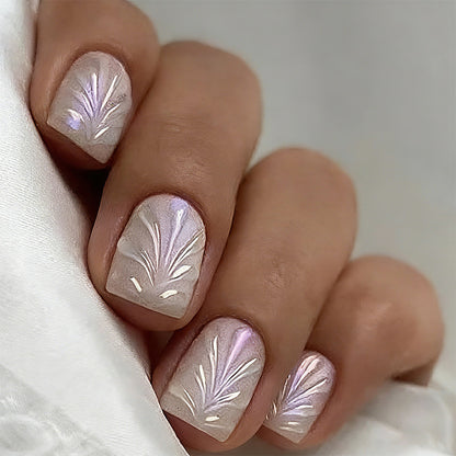 Acrylic nail set with elegant pearl details and fine floral patterns Acalora
