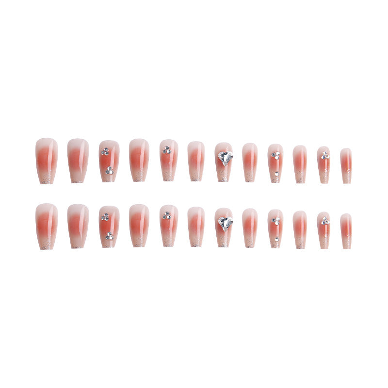 Acrylic nail set with elegant heart and rhinestone decorations Acalora