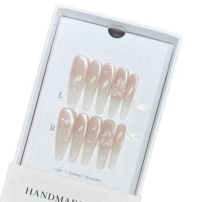 Elegant Stiletto Nail Extensions with Floral Accents Acalora