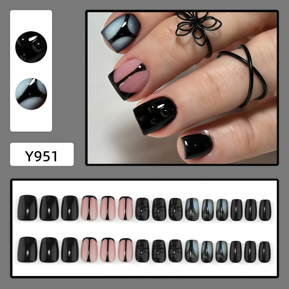 Artificial nails with elegant black and pastel accent design Acalora