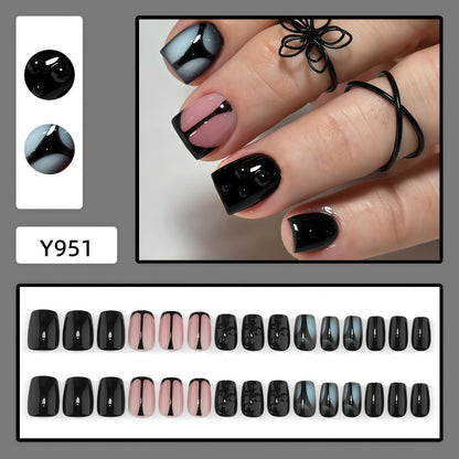 Artificial nails with elegant black and pastel accent design Acalora