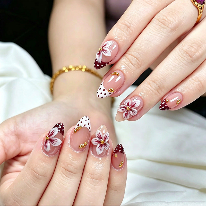 Artificial nail set with floral design and golden accents Acalora