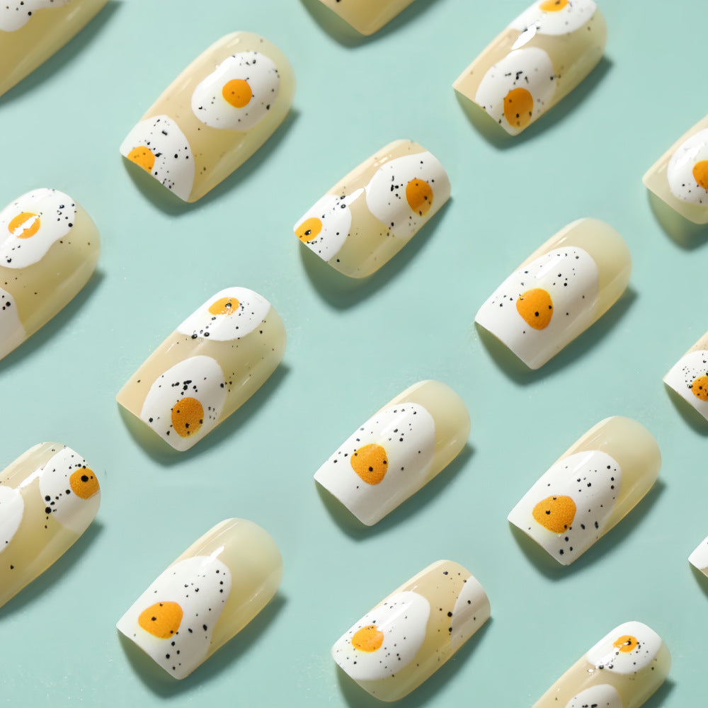 Artificial nails in creative fried egg design Acalora
