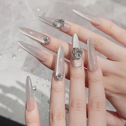 Acrylic nail set with glitter design and elegant 3D applications Acalora
