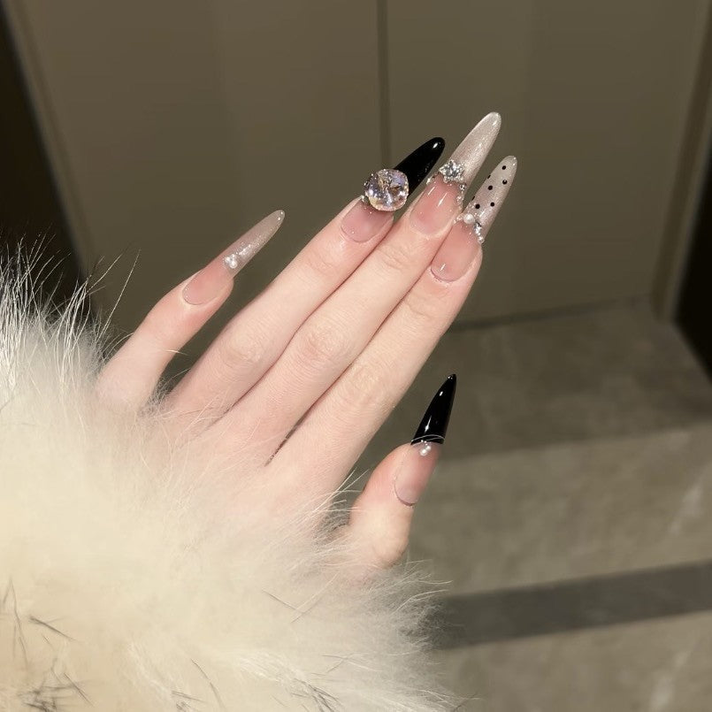 Artificial nails in elegant design with glittering decorations Acalora