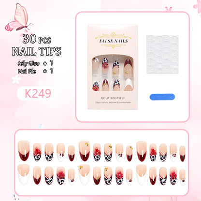Artificial nail set with elegant floral patterns and glamorous details Acalora