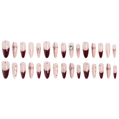 Artificial nail set with elegant bow and glitter details Acalora