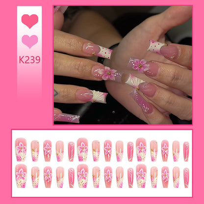 Nail art set with elegant floral motifs Acalora