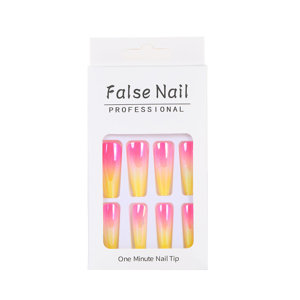 Artificial nail tips in modern ombre design Acalora
