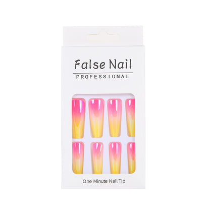 Artificial nail tips in modern ombre design Acalora