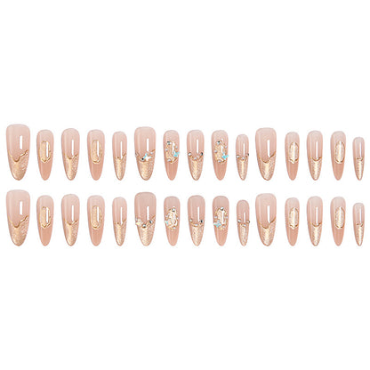 Art nail set with elegant gold glitter design Acalora