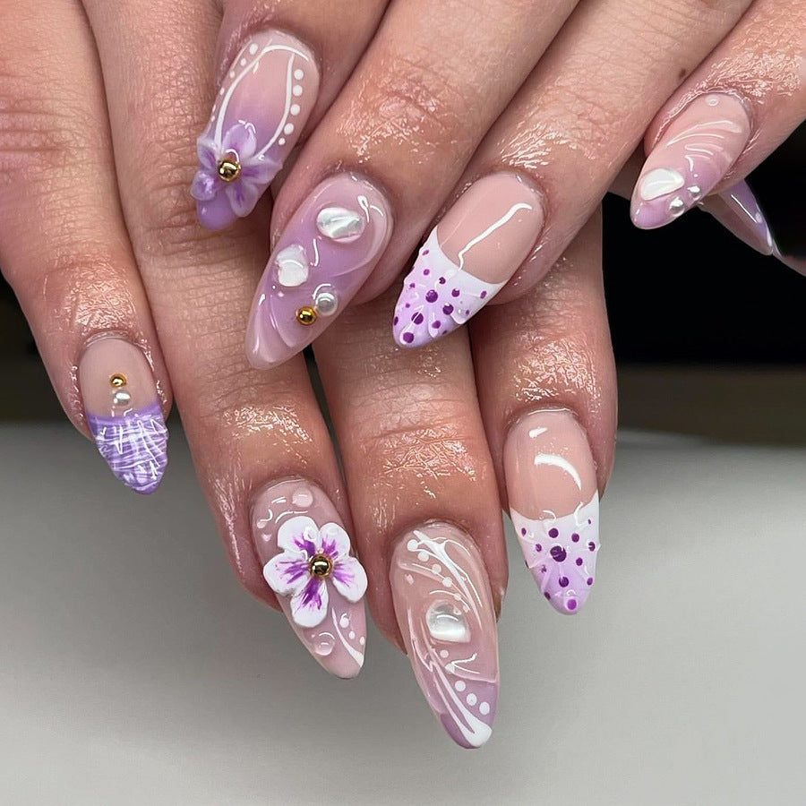 Artificial nail set with exotic floral and glitter accents Acalora