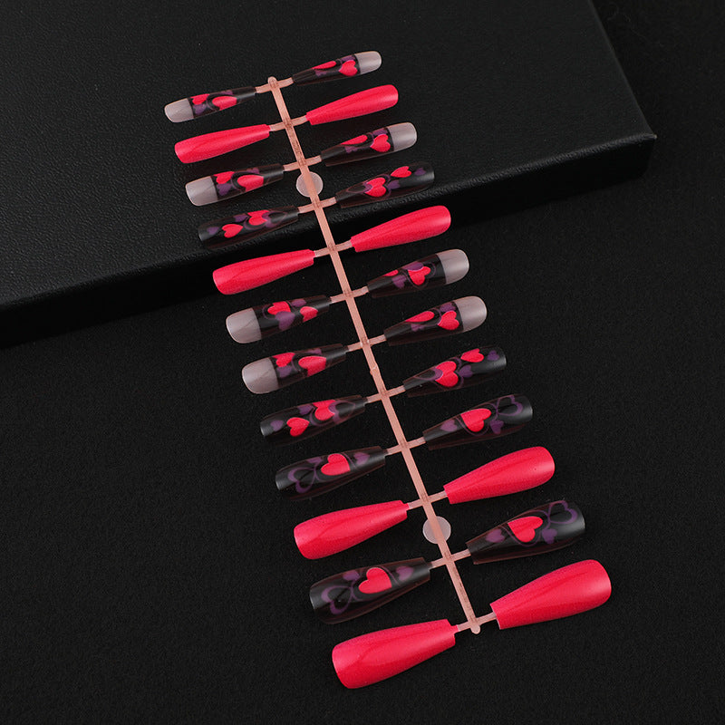 Fake nails in an eye-catching heart design Acalora