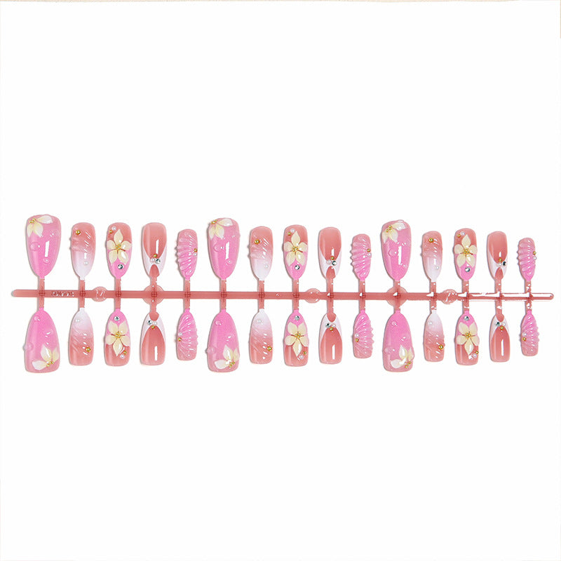 Nail art set with filigree flower patterns and sparkling accents Acalora