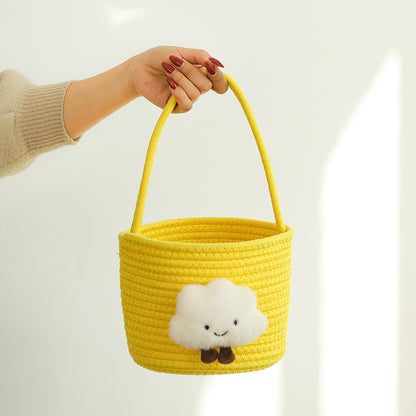 Storage basket with playful cloud motif