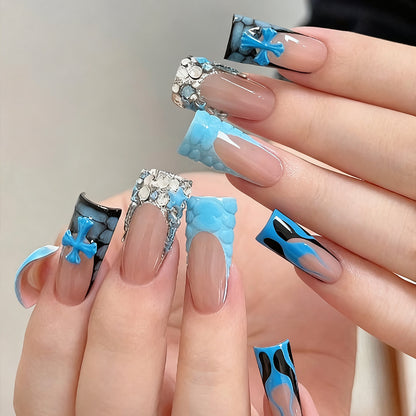 Artificial nails in a playful flower design with glittering accents Acalora