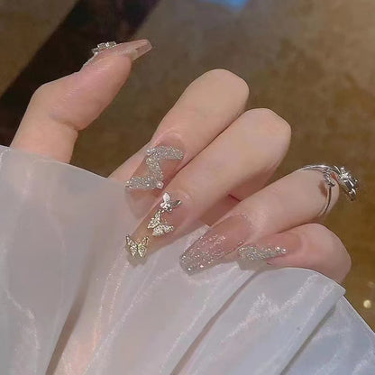 Artificial nail set with sparkling butterflies and glittering decorations Acalora