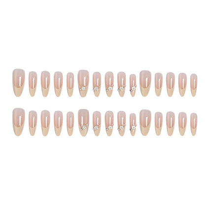 Acrylic nail set with elegant tips and sparkling appliqués Acalora