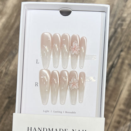 Elegant Stiletto Nail Extensions with Floral Accents Acalora