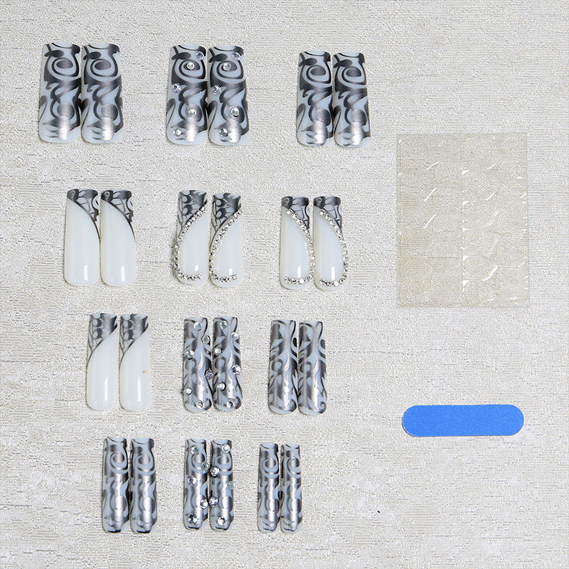 Acrylic nail set with elegant patterns and sparkling accents Acalora