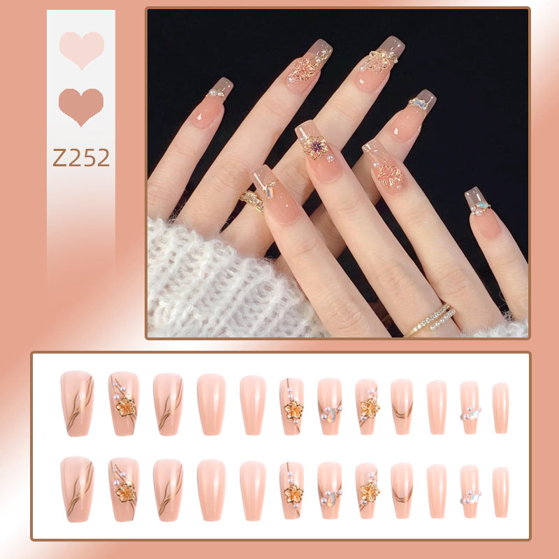 Artificial nail set with elegant floral and luxurious decorations Acalora