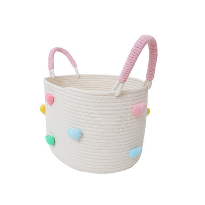 Playful storage basket with heart pattern