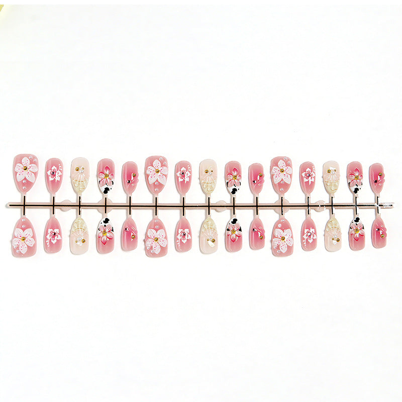 Artificial nail set with elegant floral accents Acalora