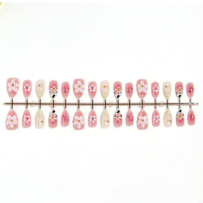 Artificial nail set with elegant floral accents Acalora