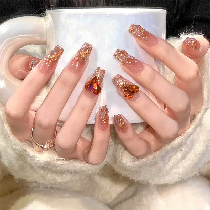 Artificial nail set with glitter and heart accents Acalora