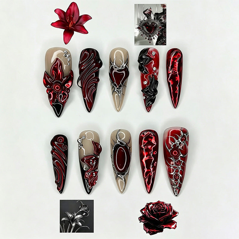 Artificial nail set with extravagant red and black designs Acalora