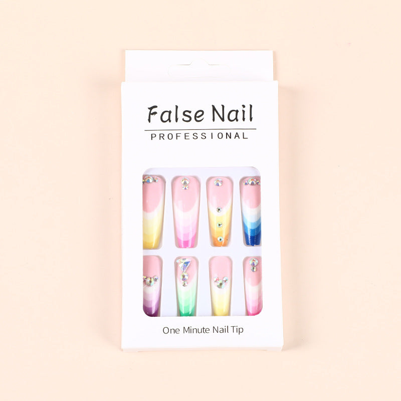 Artificial nails in luxurious ombre design with rhinestone accents Acalora