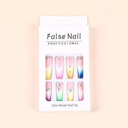 Artificial nails in luxurious ombre design with rhinestone accents Acalora