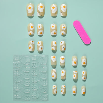 Artificial nails in creative fried egg design Acalora