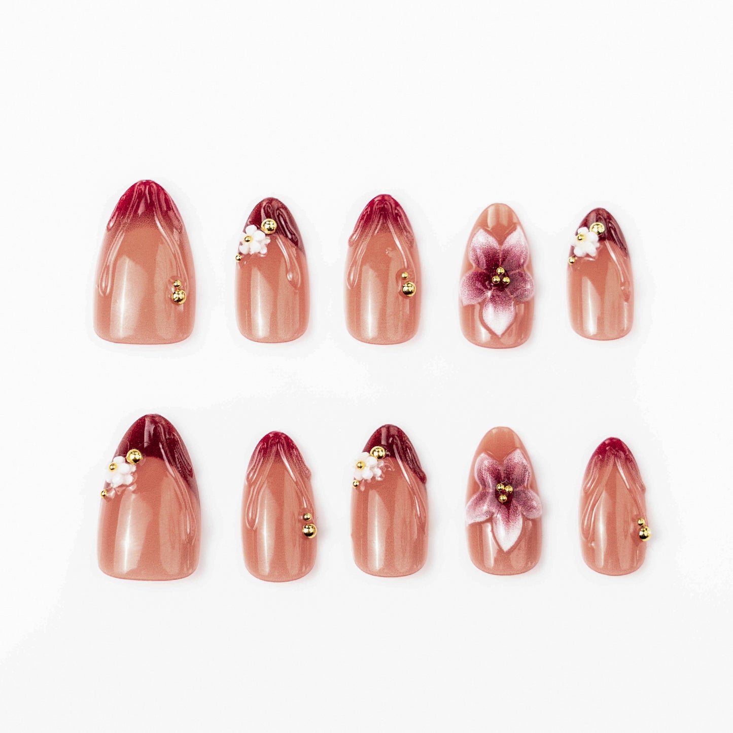 Artificial nail set with floral accents and gold embellishments Acalora