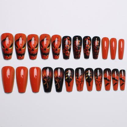Creative nail art set with Halloween motif and glowing design Acalora